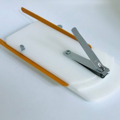 Assistive Nail Care Aid with Stationary Nail Clipper and Emory Board